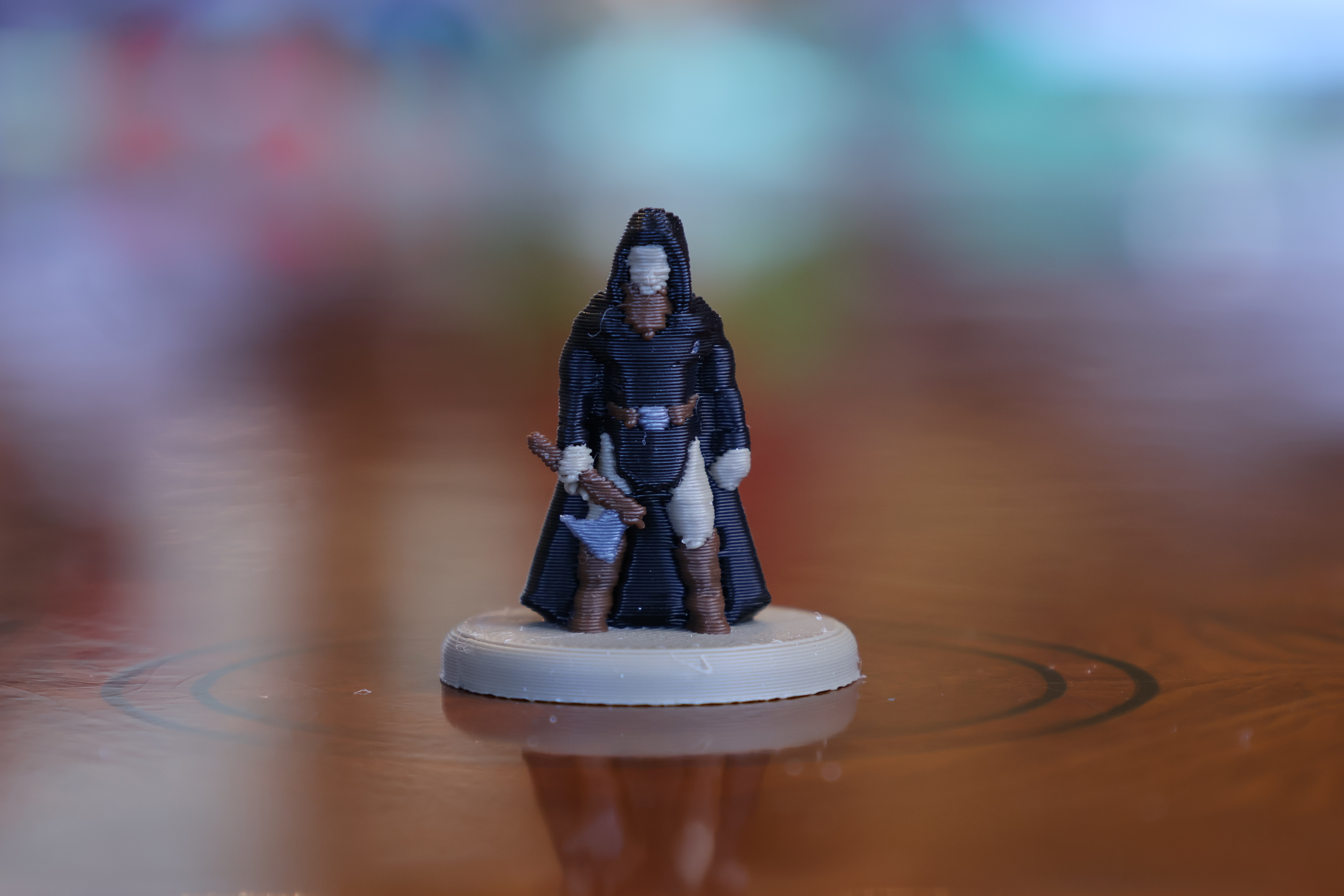 Custom 3D printed Catan robber figurine, hand-sculpted from a customer photo